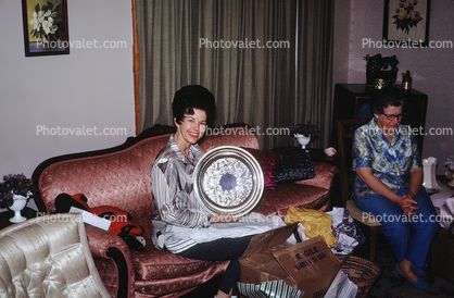 Woman with her new Silver Plate, smile, bouffant hairdoo, gifts, presents