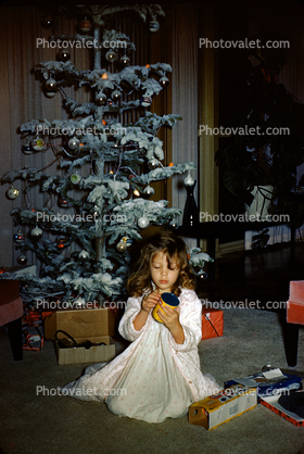Girl, nighty, decorated tree, December 1959, 1950s