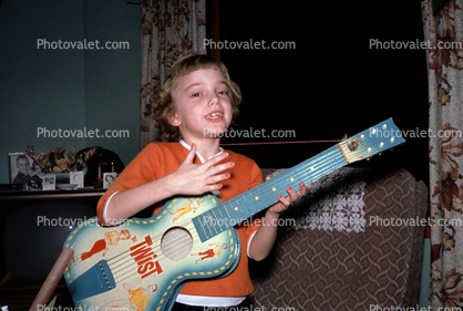 Girl with her new Guitar, Twist, December 1964