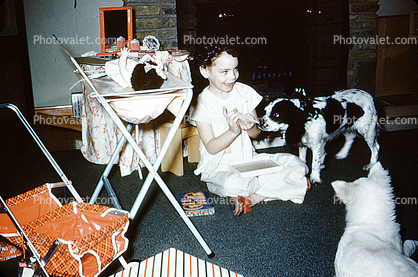 Girl with her Dogs, Doll, Changing Table, December 1953