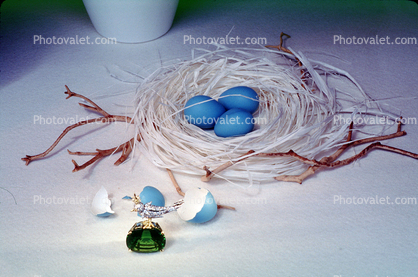 Green Jade Ring, blue eggs, paper nest, jewelery, twigs, tweeting bird