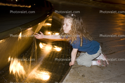 Girl playing at a Water Fountain, aquatics