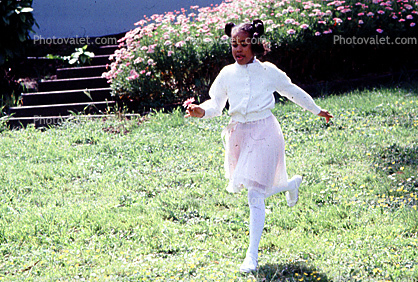 Girl running with flower