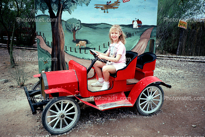Jalopy, Car, Girl, Steering Wheel, countryside backdrop, country road, 1970s