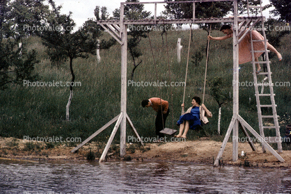 Swing into the water, ladder, gym set, 1950s