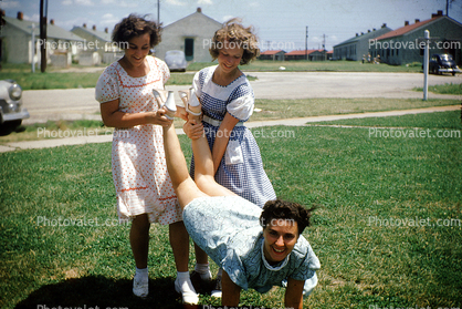 girls, wheelbarrow, formal dress, fun, smiles, dresses, 1950s