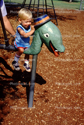 Playground in Fresno California, friendly dragon, boy, October 1982, 1980s