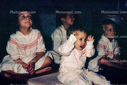 Child in happy view, pajamas, girl, boys, night gown, nighty, December 1964, 1960s