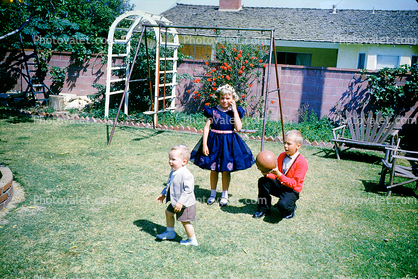 Girl, boys, ball, formal dress, Backyard, April 1960, 1960s
