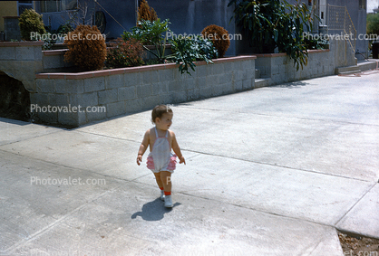 Girls playing Chase, driveway, August 1960