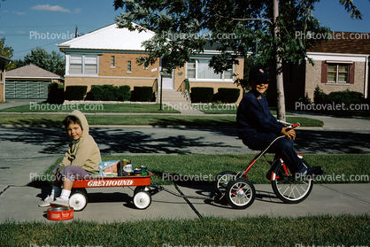 Greyhound Wagon, Girl, Boy on a Tricycle, suburban, home, September 1962, 1960s