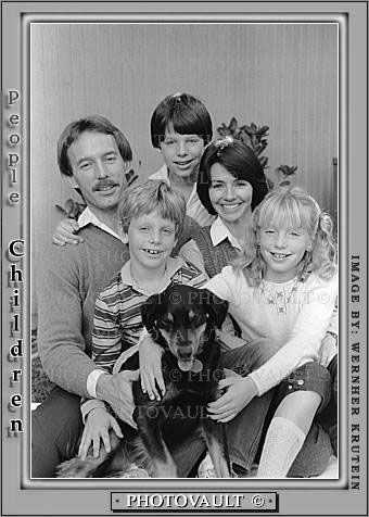 Family Group Portrait with Dog, smiles, brother, sister, siblings, mother father