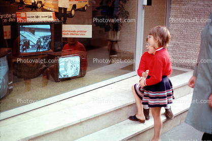 Girl watching TV, Television Screen, window shopping, October 1972, 1970s