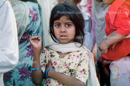 Girl in a crowd, face, Mumbai, India