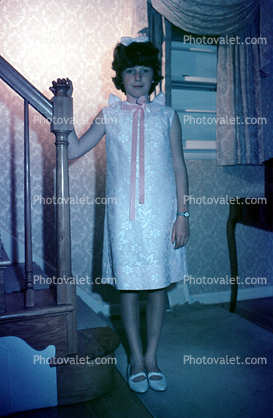 Girl, indoors, formal dress, ribbon, 1950s