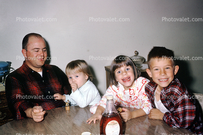 Father with Children, boy, girl, siblings, daughter, son, syrup, nightwear, 1950s