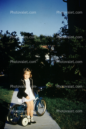 Girl, Training Wheels, Bicycle, smiles, 1960s