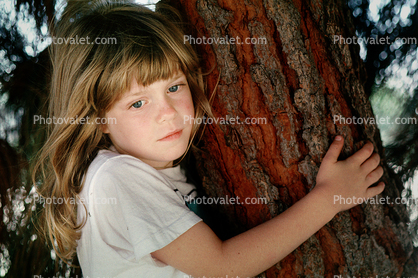 Pensive Girl, tree, deep in thought
