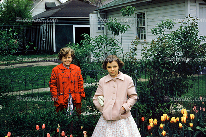Two Girls, friends, backyards, flowers, tulips, 1950s