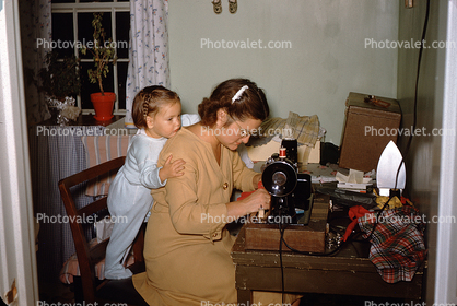 Vicky looks over Moms Shoulder, Sewing Machine, Hug, adorable, 1950s