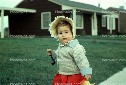 Toddler Girl Wearing a Bonnet