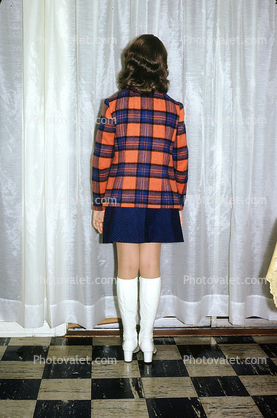 Teen Girl Stands with her back towards viewer, 1960s