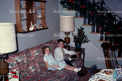 Sister, Brother, boy, girl, sofa, couch, lamps, figurines, steps, stairs