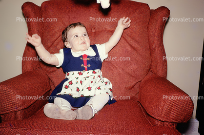Girl Toddler in a chair