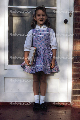 standing smiling schoolgirl, Decatur Illinois, December 1962, 1960s