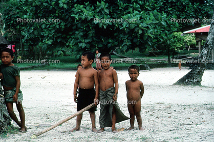 boys on a beach, stick, Tuasivi, Savai'i island, Samoa, 1950s
