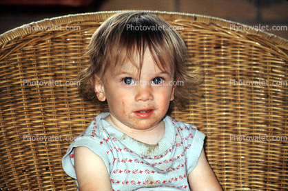 Girl, messy hair, muss, face, wicker chair, Erol, Gokyigit, July 1971, 1970s