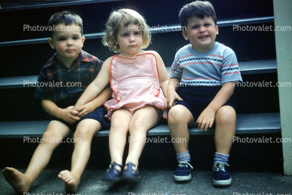 Girl, Boys, siblings, sister, brother, sitting, 1950s