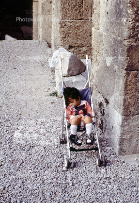 sleeping child, stroller, 1950s