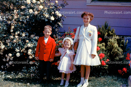 Siblings, brother, sisters, formal dress, tiara, smiles, 1950s