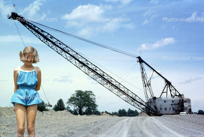 Girl and Huge Crane, smiles, 1950s