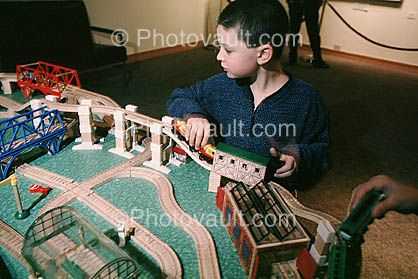 train set, boy playing with trains
