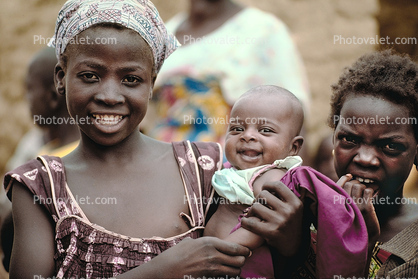 Teen Mother with Baby, smiles, infant, Burkina Faso