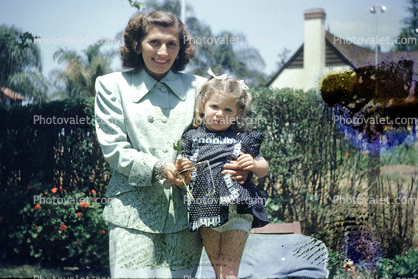 Mother with Daughter, backyard, 1940s
