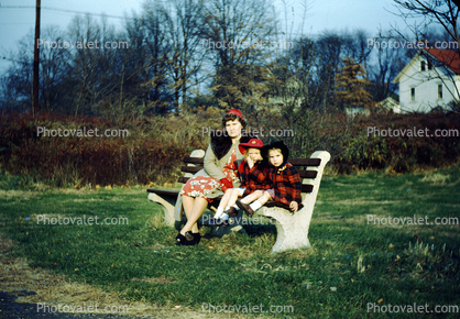 Mother with her sons, bench, 1950s