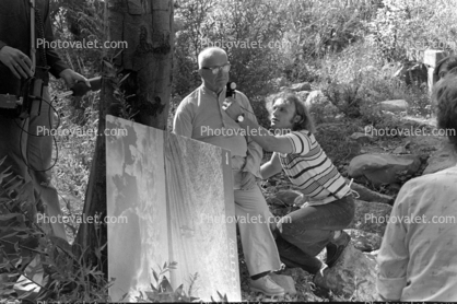 Wernher Krutein holds up light meter, Bucky at a filming session, Topanga Canyon