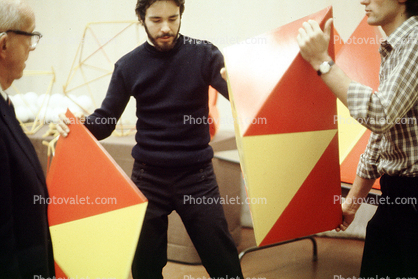 Tetrahedron, Bucky preparing polyhedra models, "Conversations with Buckminster Fuller" event, Oakland, Polyhedra