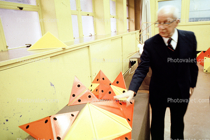 Bucky preparing polyhedra models, "Conversations with Buckminster Fuller" event, Oakland
