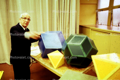 Dodecahedron, Bucky preparing polyhedra models, "Conversations with Buckminster Fuller" event, Oakland, Polyhedra