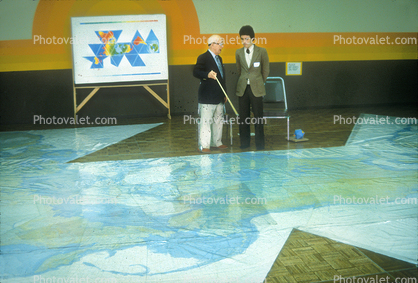 Buckminster Fuller on a huge Dymaxion Map, Being with Bucky event, Los Angeles