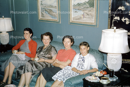 ladies, girl, smiles, couch, sofa, living room, lights, lamps, lampshade, 1940s
