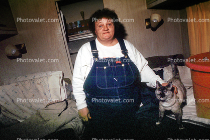 Fat Woman, overalls, cat, smiles