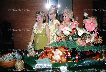 Flowery Dress, Lei, smiles, food table, beehive hairdo, blondes, October 1964, 1960s