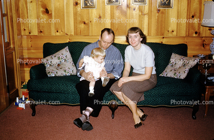 Mother, Father, Daughter, parents, sofa couch, pillows, March 1961, 1960s