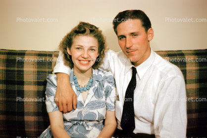 Wife, Husband, smiles, tie, necklace, 1940s