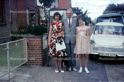 Family, Mother, Father, Dad, Mom, sidewalk, Cars, vehicles, 1950s